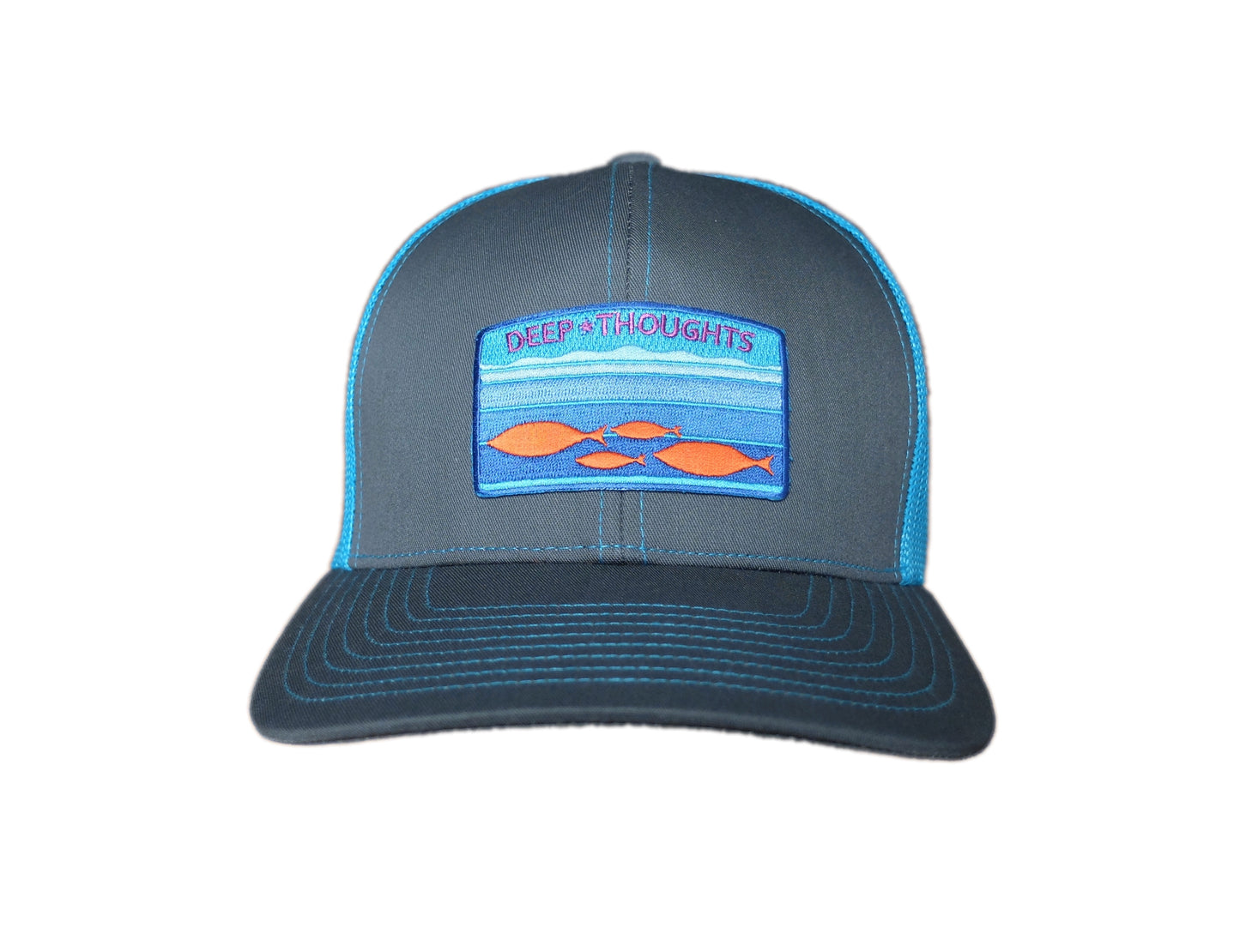 front view of graphite grey and neon blue trucker cap with aqua blue embroidered patch showing fish beneath ocean currents