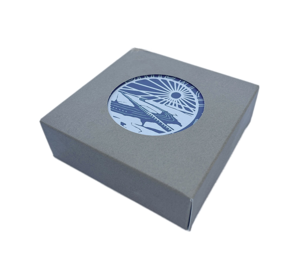 Boxed set of 4 ceramic drink coasters featuring a blue and white illustration of Sandy Neck Beach in Sandwich, MA
