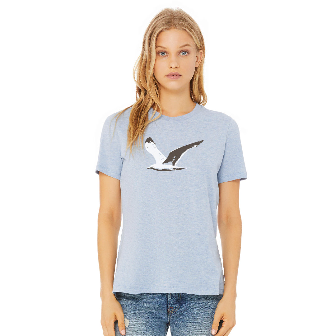woman wearing heather ice blue t-shirt with black and white flying seagull graphic